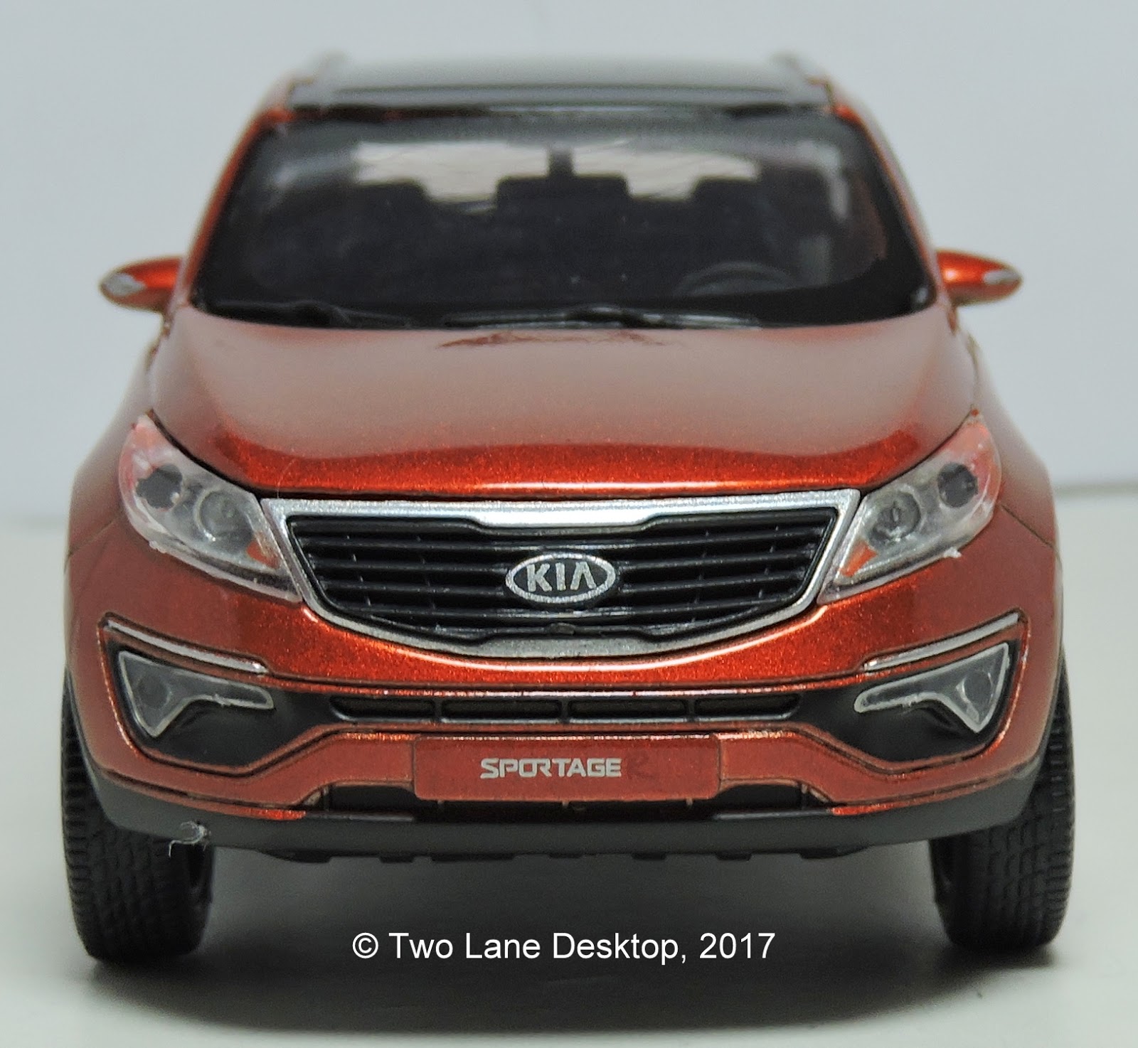 1:43 scale 2013 Kia Sportage R and Kia Grand Carnival (Sedona)
