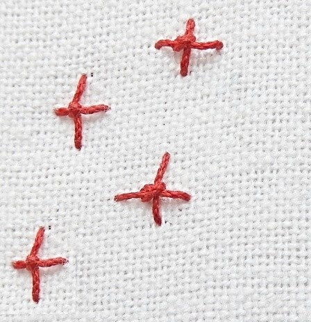 Thêu dấu nút sao 4 chân - Hình 1