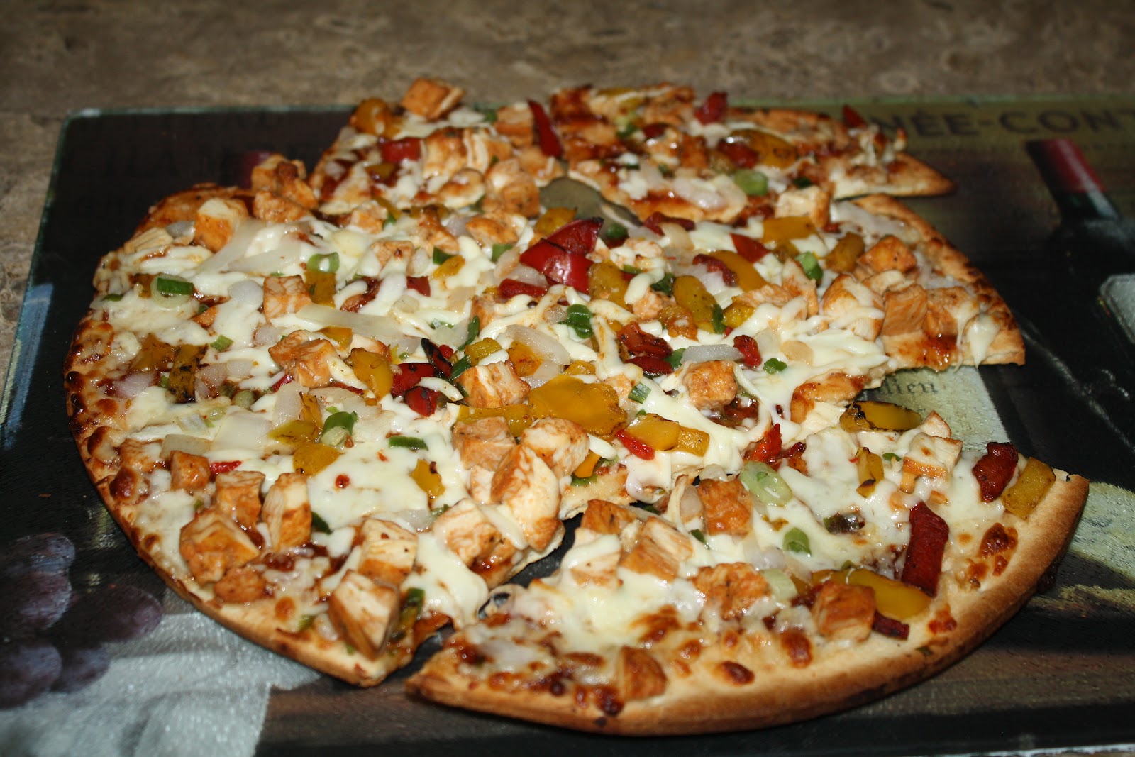 An Immovable Feast CPK Frozen Jamaican Jerk Pizza