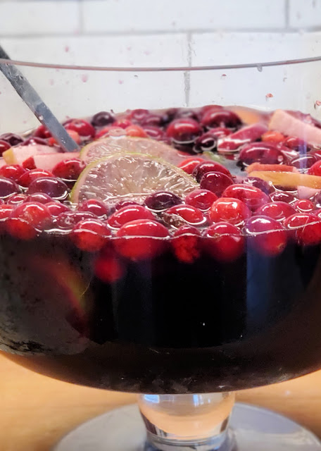 glass bowl of holiday spice sangria