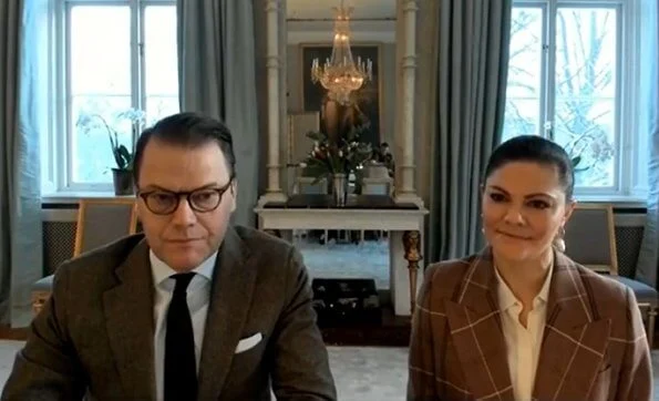 Crown Princess Victoria wore wool and cotton blend suit from Acne Studios, and baroque pearl earrings from Cravingfor Jewellery