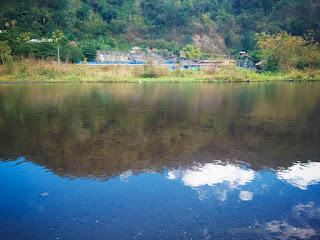 Wide Water Puddle Around The Dam Output Area In The Valley Of Hills Titab Ularan North Bali Indonesia
