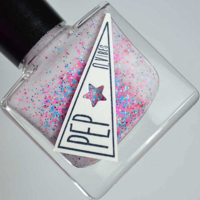 white crelly nail polish with bright glitter