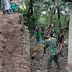 Babinsa Bersama Warga Bersihkan Material Longsor