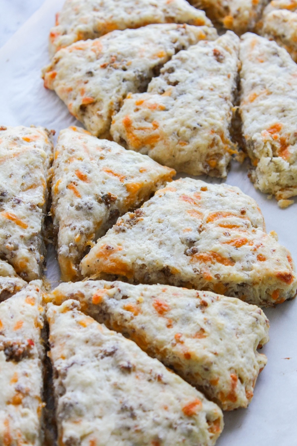 Sausage and cheddar cheese are the stars in these tender and flaky savory scones. They are the perfect addition to your breakfast or brunch menu!