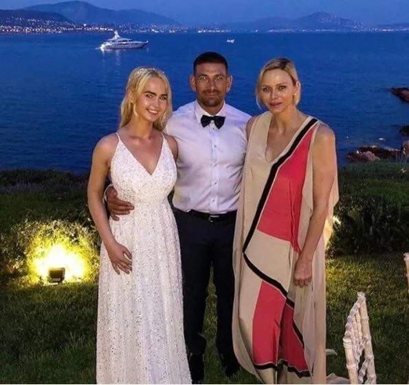 Princess Charlene wore a silk gown from Spring-Summer 2019 collection of Akris. Christos Fiotakis Elite fitness MC in Monaco