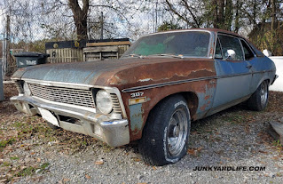 An Astro Blue 1970 Chevy Nova sits outside a body shop in Alabama.