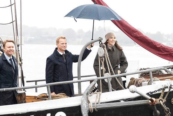 Crown Princess Mary attended the celebrations of the 50th anniversary of the new Little Belt Bridge The bridge connects Jutland and Funen. Topshop vinyl trench coat with contrast stitching in green. khaki checked trench coat