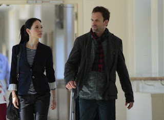 Jonny Lee Miller and Lucy Liu as Sherlock Holmes and Joan Watson in Elementary Episode # 5 Lesser Evils