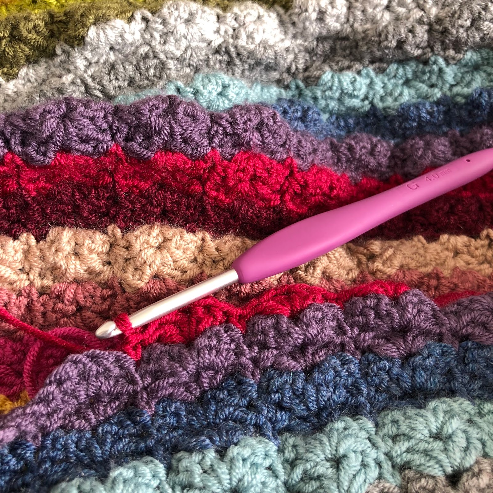 Crochet between worlds Woohoo! The finished Hydrangea Stripe Blanket