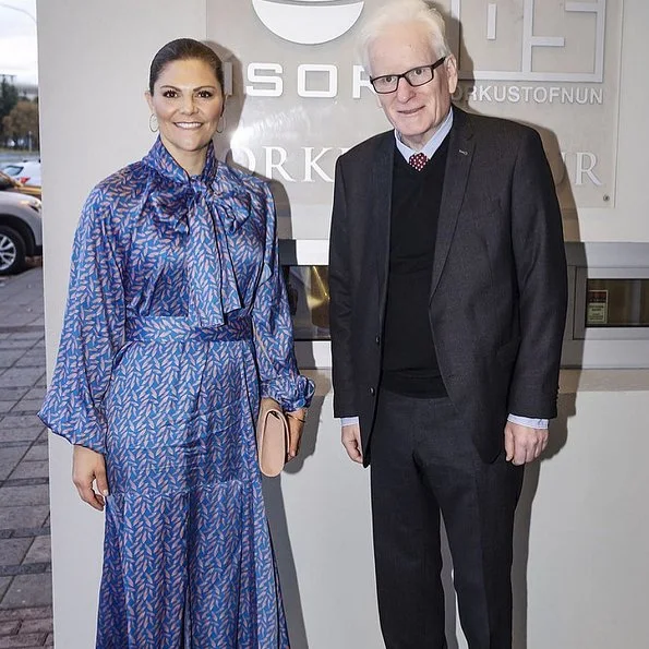 Crown Princess Victoria wore StarStudio PR Baroque pearl earrings, a new printed dress by Rodebjer. HM Dark blue dress