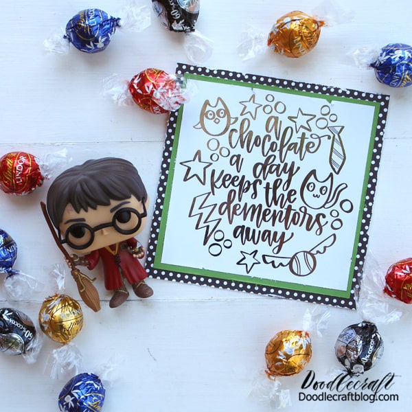 How to Heat Foil a Harry Potter Card! A chocolate a day keeps the dementors away! Professor Remus Lupin has to be one of my most favorite characters from the Harry Potter saga. "Eat, you'll feel better." Is my all time favorite Harry Potter quote.  I put together this fun card as the perfect addition to some chocolate! Make a great gift for a friend or hang the printable in the kitchen as the perfect reminder of what's important.