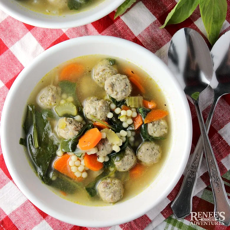 Overhead view of a bowl of Easy Italian Wedding Soup by Renee's Kitchen Adventures