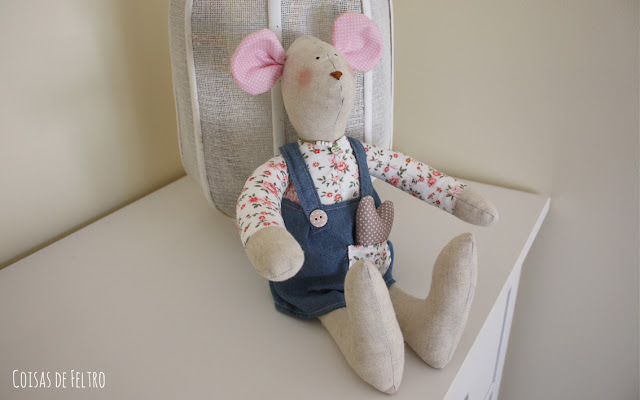 Em tecido boneco de pano