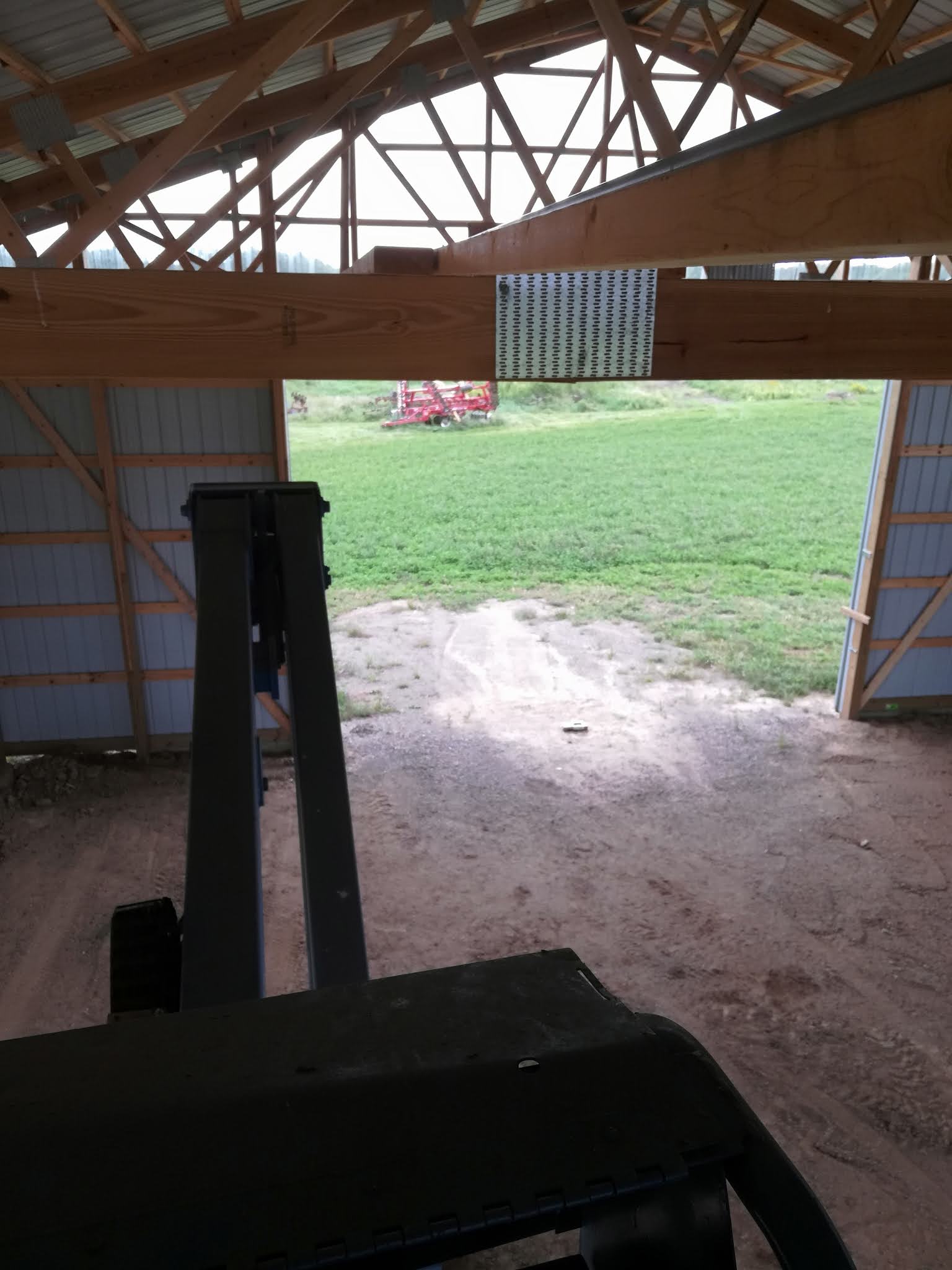 Grass Creek Farm Putting Up Lights in the New Machine Shed
