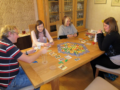 Settlers of Catan - The players with lots of cards!