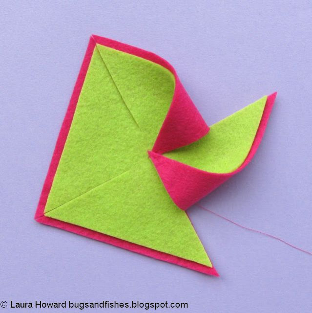 DIY Felt Pinwheels Summer Wreath Tutorial fold in the points of the felt pinwheel