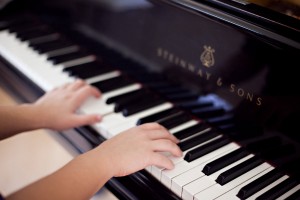 girl playing piano