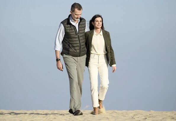 Queen Letizia wore Emporio Armani Crepon long dress with polka dot jacquard motif. Doñana Natural Park in Almonte