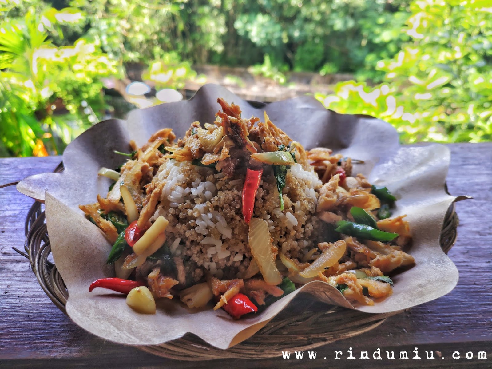 A portion of sego thiwul served with spicy stir-fried chicken at Kopi Plosok Sego Thiwul cafe in Kebon Krapyak Cottage in Sleman Jogja