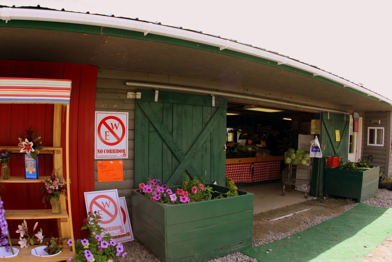 we eat. happy. stutzman's farm stand. doverfoxcroft, maine.
