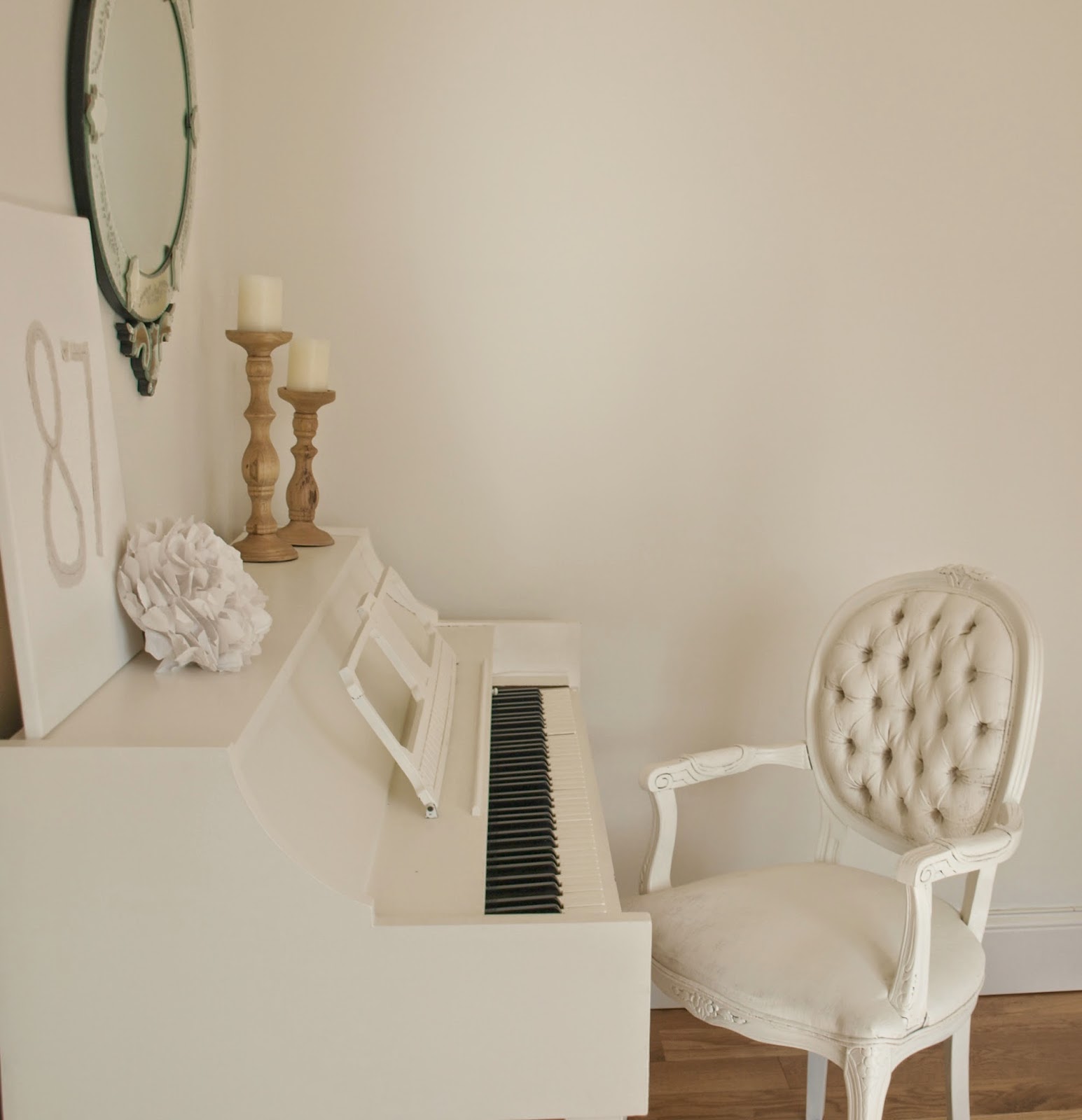 Hello Lovely Studio white piano and Louis chair