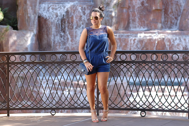 Blue silk romper, Chanel caviar mini handbag, Sam Edelman Serena Sandals and Alexis Bittar bangles.