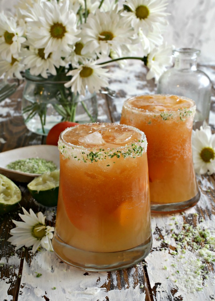 Recipe for a bourbon cocktail with fresh muddled apricots, lime juice and elderflower liqueur.