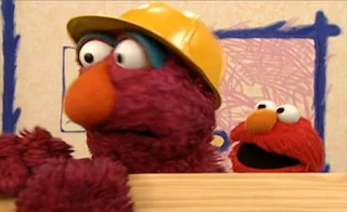Telly carries a very long wooden plank to build things. Sesame Street Elmo's World Building Things