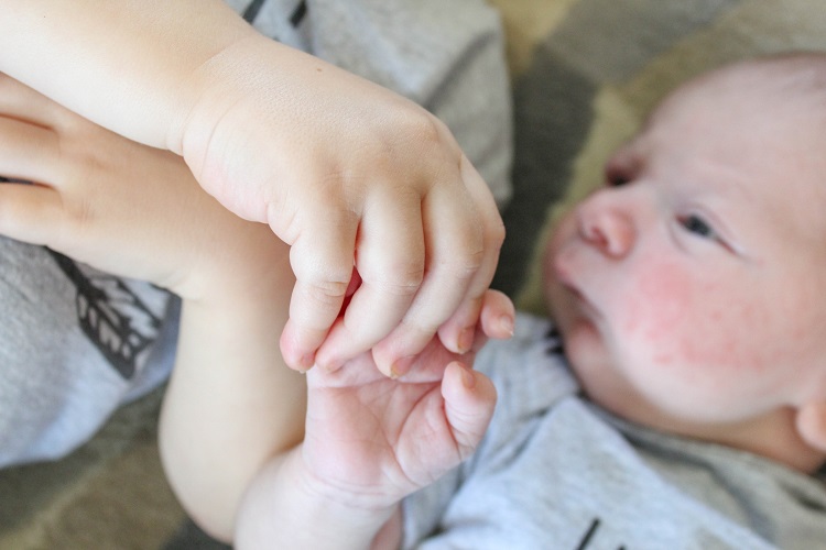 Transitioning Your Toddler to Life with a Baby Simple Moments Stick