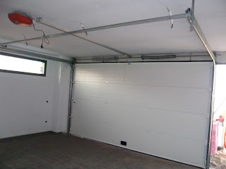 NORBEL CARPINTERIA METÄLICA Y ACERO INOXIDABLE: PUERTA SECCIONAL CON