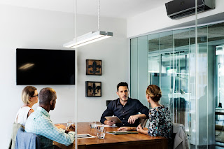 Board members talking in conference room