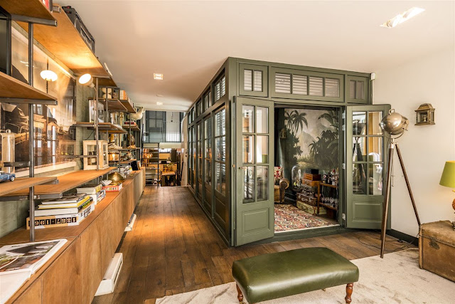 Former garage in Amsterdam transformed into an amazing industrial style home