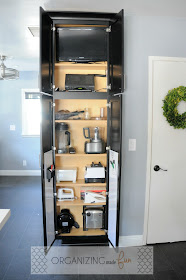 Utility Organizer Cabinet used for storing hidden TV and small appliances :: OrganizingMadeFun.com