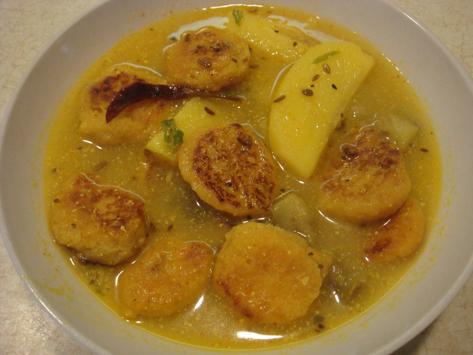 Subhra's Kitchen Dal Dumpling Curry In Mustard sauce