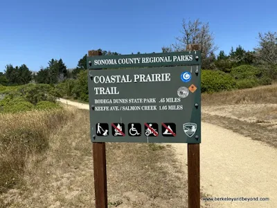 Coastal Prairie Trail sign by Children’s Bell Tower in Bodega Bay, California