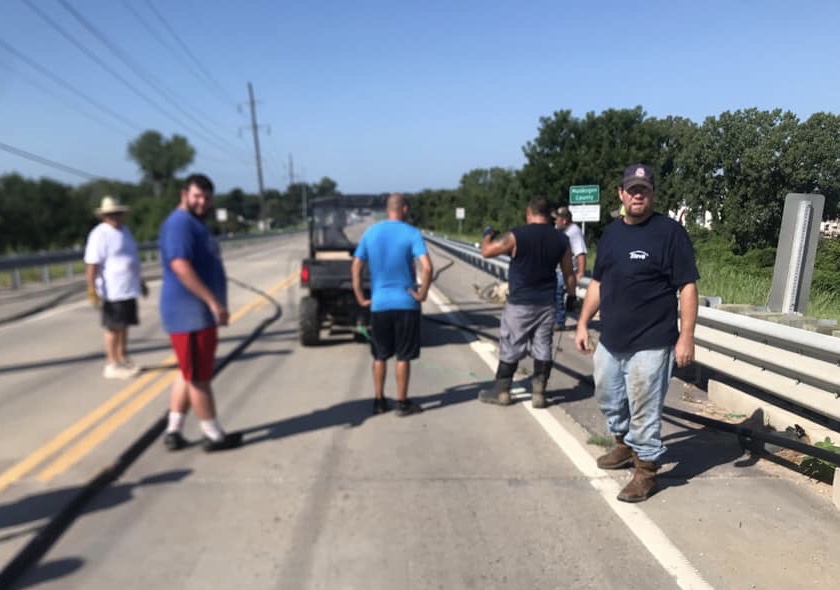 KXMX Local News Volunteers Help Move bers Falls Water Line