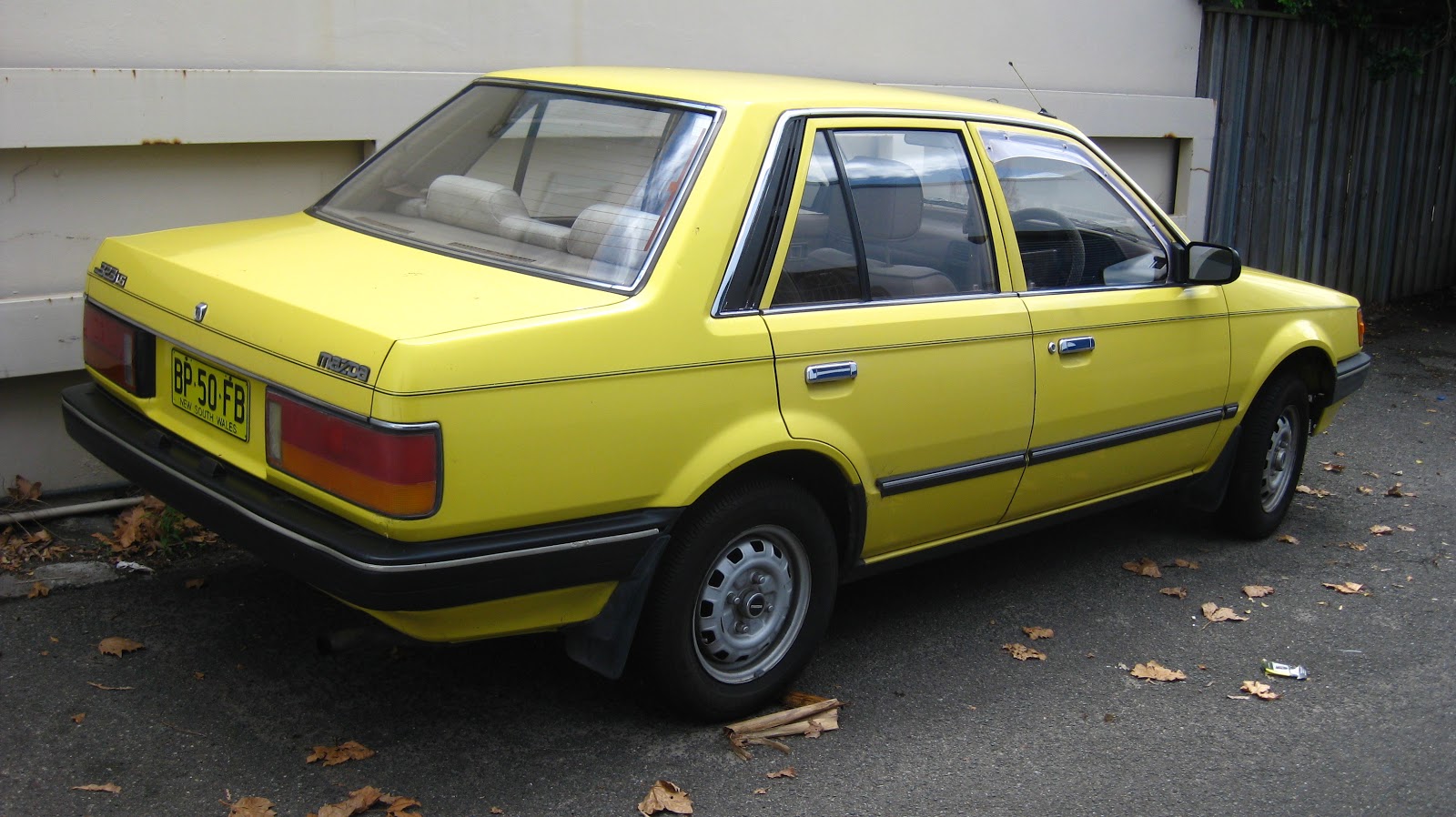 Aussie Old Parked Cars 1986 Mazda BF 323 1.6 Sedan