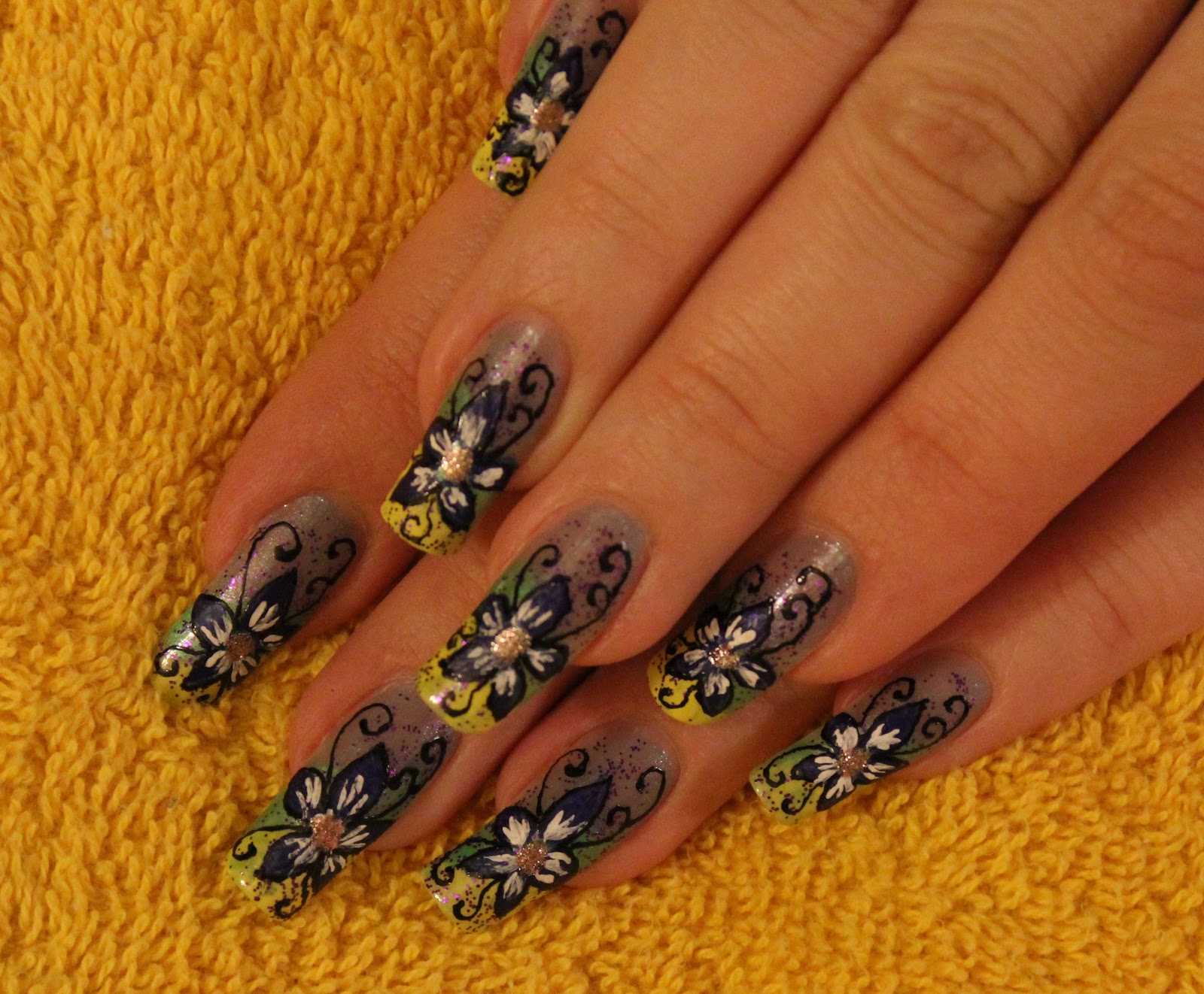 3. Step-by-Step Blue Floral Nail Art - wide 8