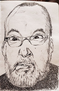 Middle aged man with glasses and beard ink sketch