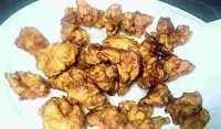 Fried chicken on a absorbent paper for chilli chicken recipe
