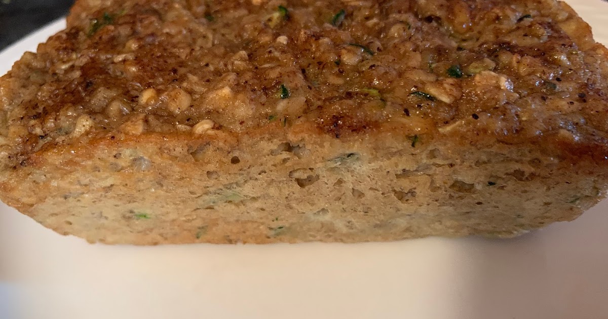 Dish with Dee Zucchini Banana Bread in a mini loaf pan
