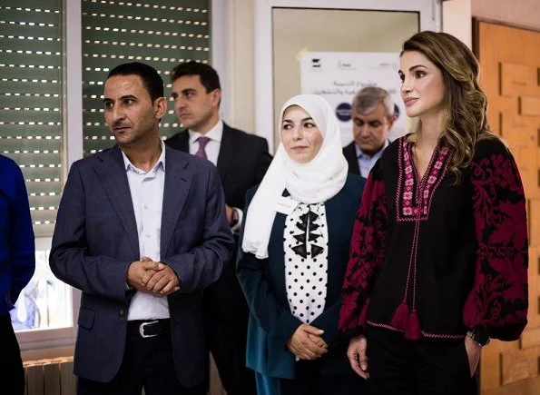 Queen Rania visited the Jordanian Association for Human Development in Jerash. Queen Rania wore Talitha Salma embroidered blouse.