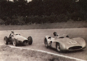 Ascari, in his Lancia, chases the legendary Argentina Juan Manuel Fangio, in a Mercedes, in a 1954 race