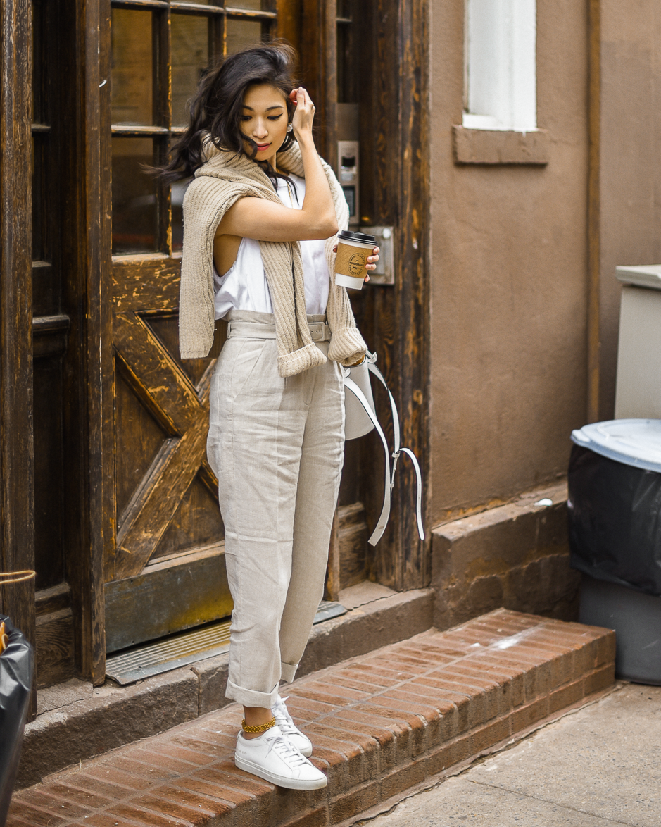 Belted linen trouser with ribbed knit sweater, Spring casual style, neutral spring outfits in New York, white bucket bag outfit ideas, Spring outfits layering, transitional style - FOREVERVANNY.com