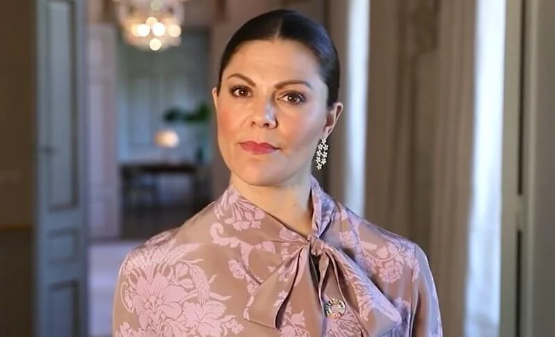 Crown Princess Victoria wore a floral-jacquard dress from Acne Studios, and rose gold poppy earrings with diamonds from Kreuger Jewellery