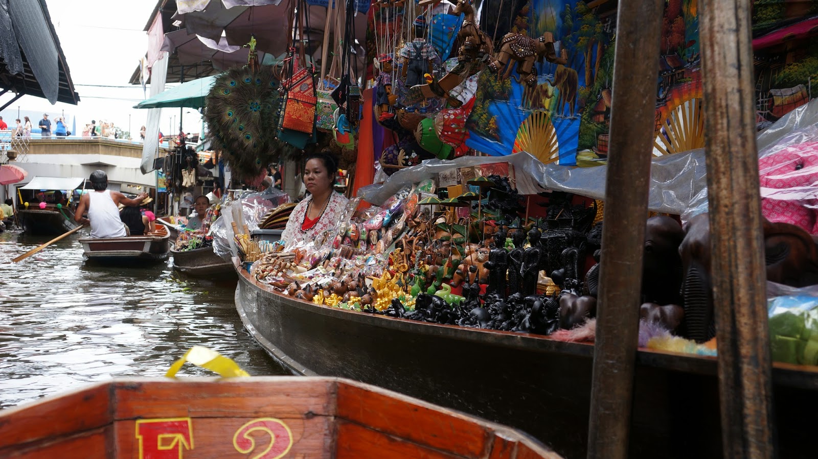 Damnoen Saduak Floating Market. The place felt overly touristy to me, every few minutes you'll be prompted to buy something and it does get annoying at times