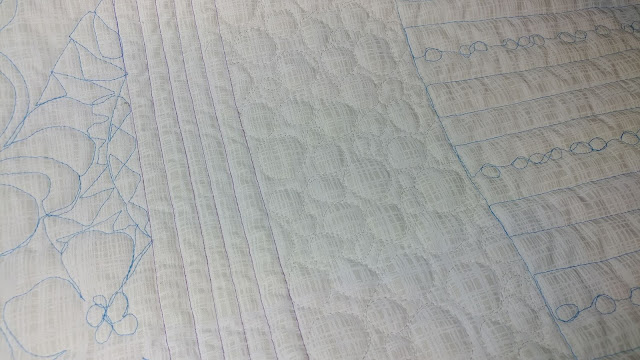 Free motion quilting on a baby quilt