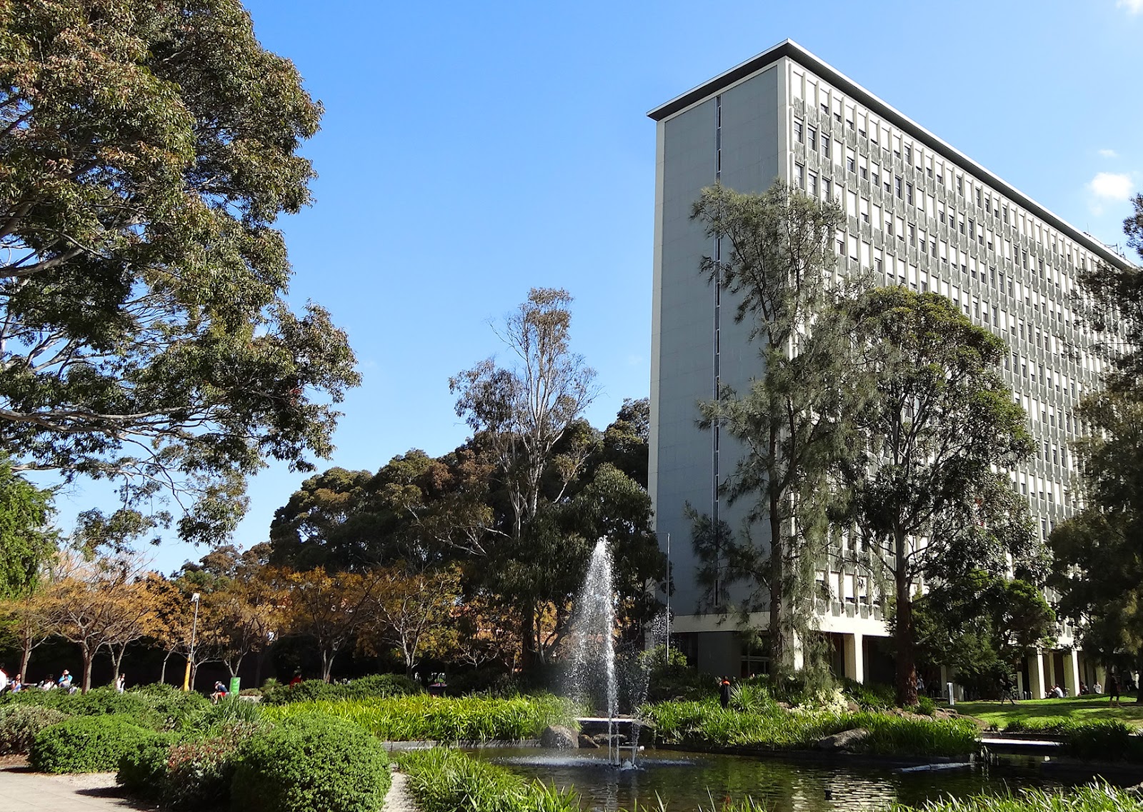 Review university. Monash University Logan Hall. Monash University student Housing BVN. Monash University Australia. University Campus Lawn.