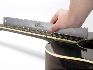 image a nothched straight edge on a guitar neck
